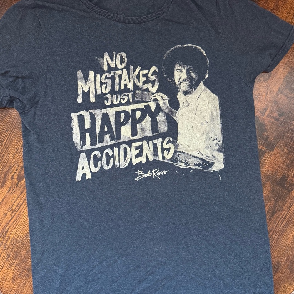Bob Ross Shirt– “No Mistakes, Just Happy Accidents”
Size: Small